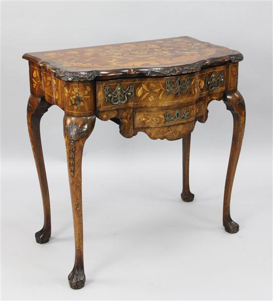 An early 19th century Dutch floral marquetry and walnut side table, W.2ft 5in. D.1ft 6in. H.2ft 6in.